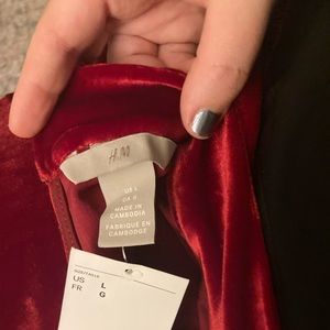 Never worn H&M long sleeved velvet red bodysuit with cleavage slit